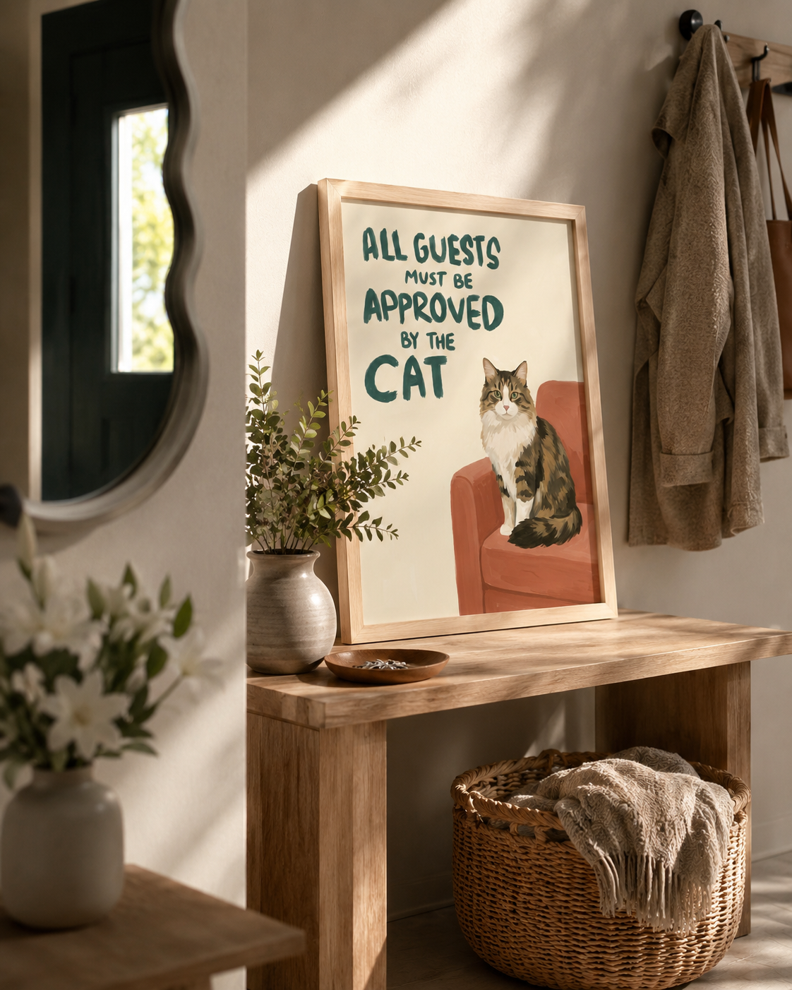 Oak framed typographic pet print on a hallway console table